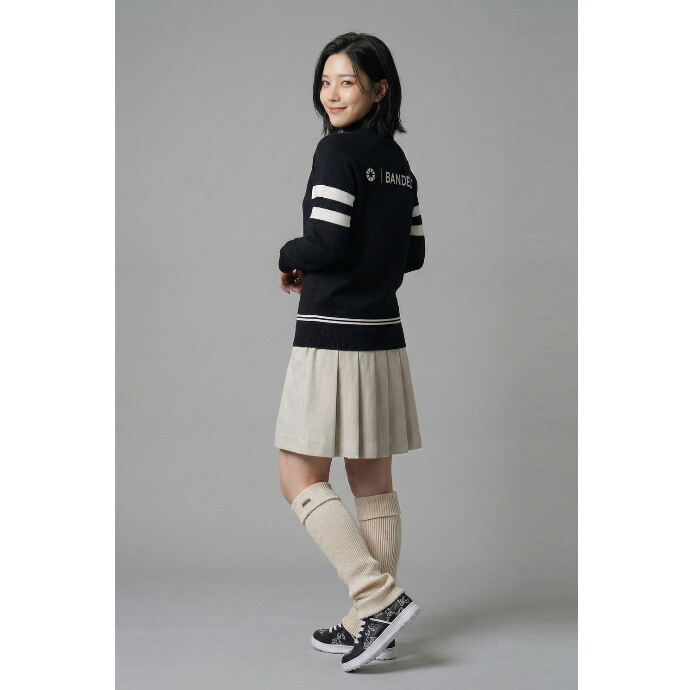 BANDEL GOLF「冬の着膨れは、もう卒業。暖かさと『細見え』を両立する、大人の賢いモノトーン。」